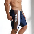 Navy blue and brown metroamalewear jammer swim boxer with white vertical stripe and bold m logo for athletic use