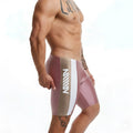 Metro malewear new jammer swim boxer in pink and beige with a white vertical stripe featuring mill logo