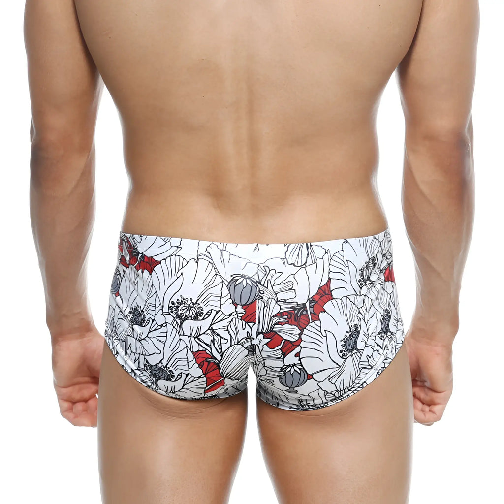 MetroMaleWear Oscar boxer swim trunks white with bold floral pattern black outlines and red accents