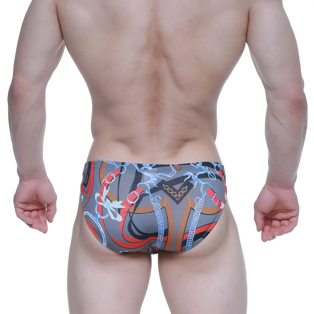 Gray metroMalewear padu bikini 5103-m34 swim trunks with bold red orange and blue chain pattern and decorative bows