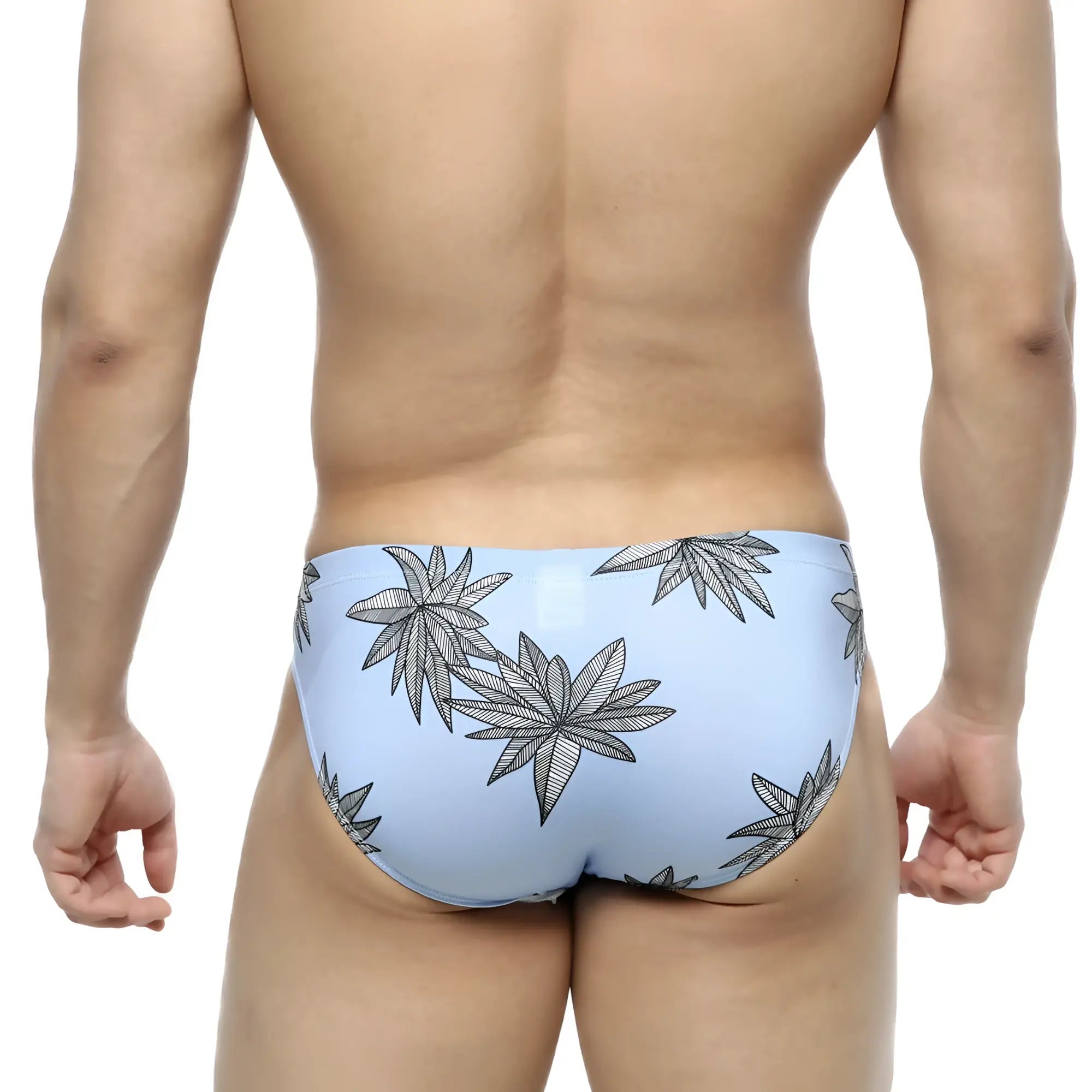Light blue metroMalewear palma bikini 5103-49 swim trunks with bold black leaf pattern for casual beachwear