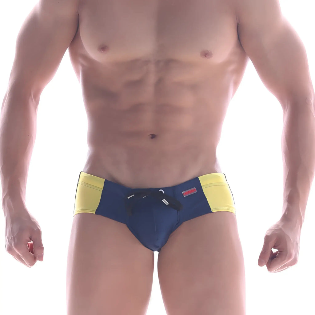 MetroMaleWear panel swim brief navy 4935-28 featuring blue and yellow swim trunks with black drawstring waistband