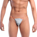 Silver thong with orange trim and small red metro male wear brand tag perfect for stylish male underwear