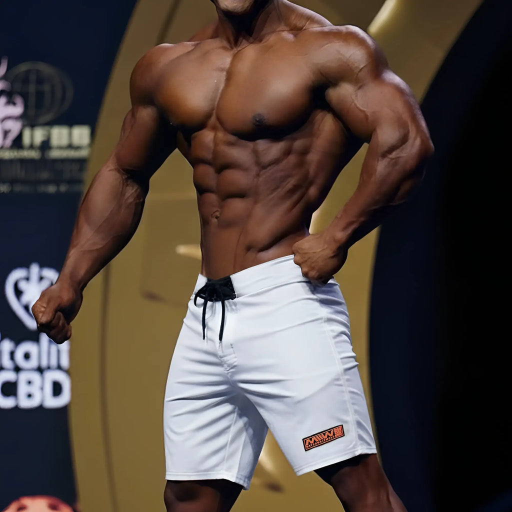 MetroMalewear physique board short white with black drawstring and small orange logo on lower right leg for athletic use