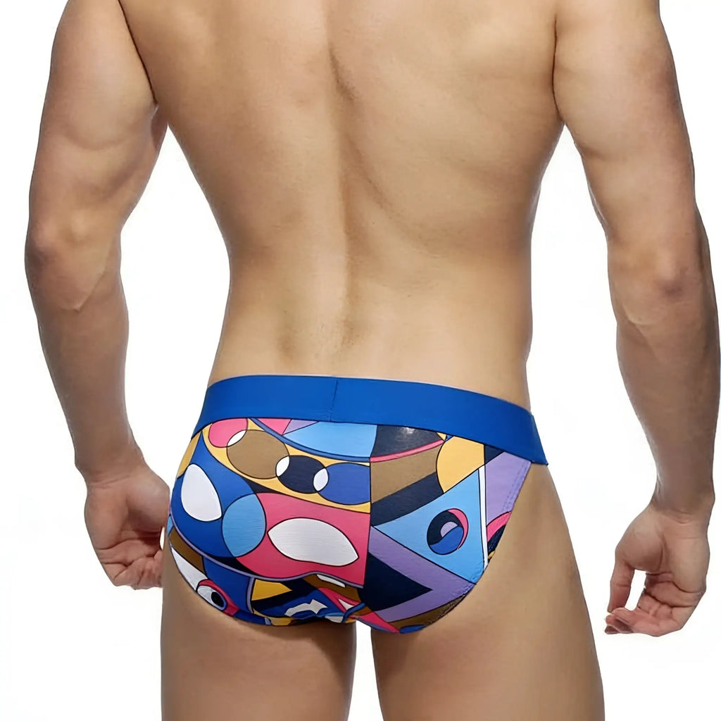 Vibrant geometric-patterned swim trunks with bold blue waistband metroMalewear picasso bikini 3004-87