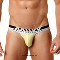 Yellow metromalewear pima cotton hip thong briefs with a black and white striped waistband featuring the brand name