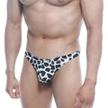 Metro male wear pouch thong dalmatian in black and white cow print with small brand tag at the waistband