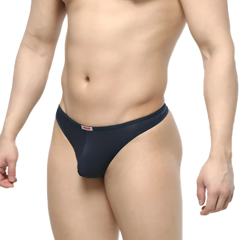 Navy blue sheer mesh pouch thong by MetroMaleWear with a small red and white brand tag on the waistband