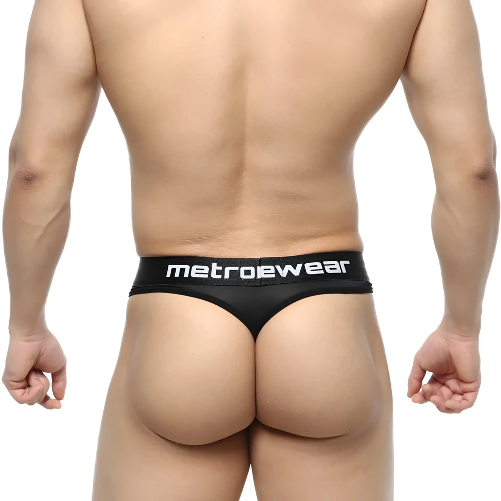 Black metrowear prado thong with sleek minimalist design and white branding on waistband, front view