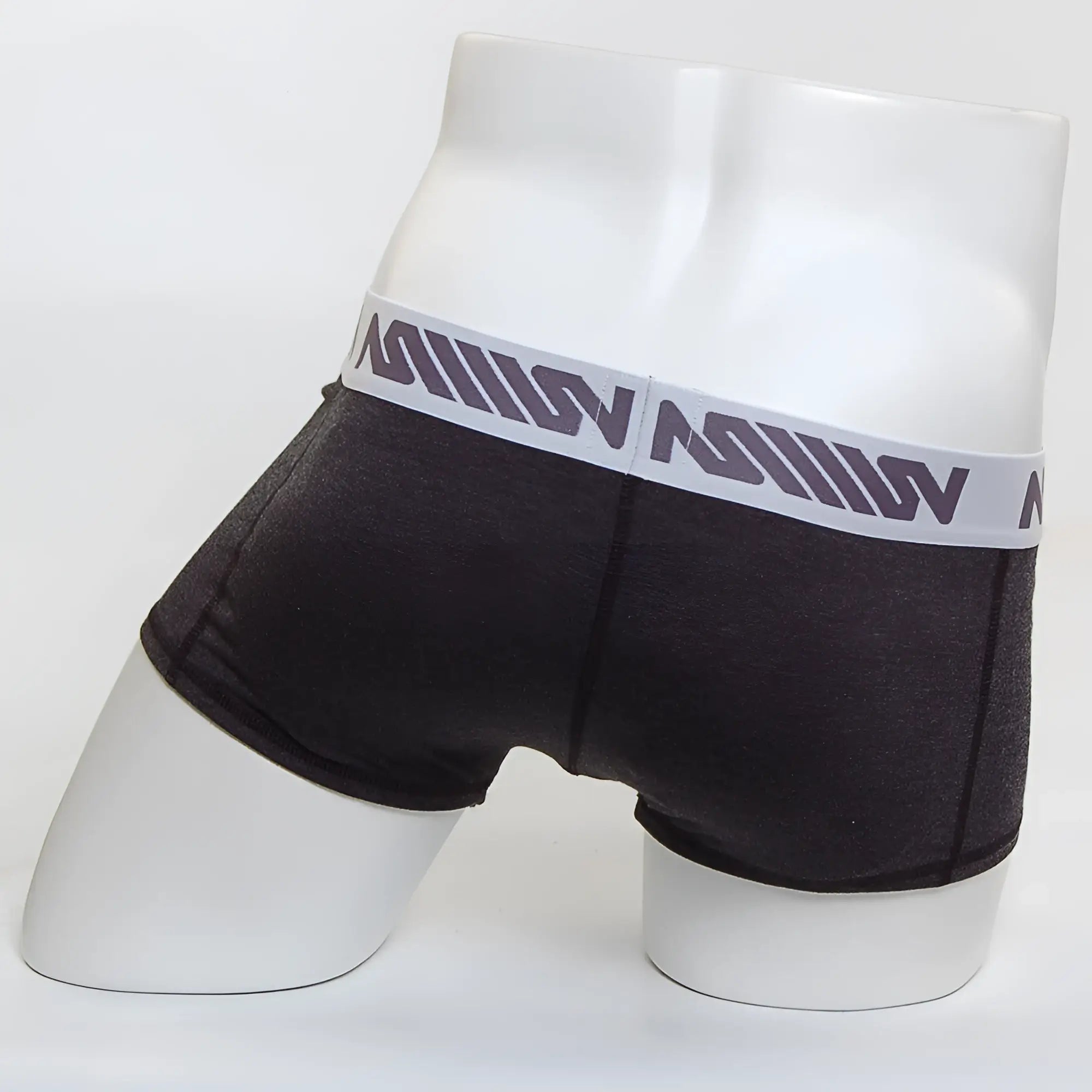 Dark gray heathered metro malewear premium padded boxer briefs with white elastic waistband and gray geometric logo pattern