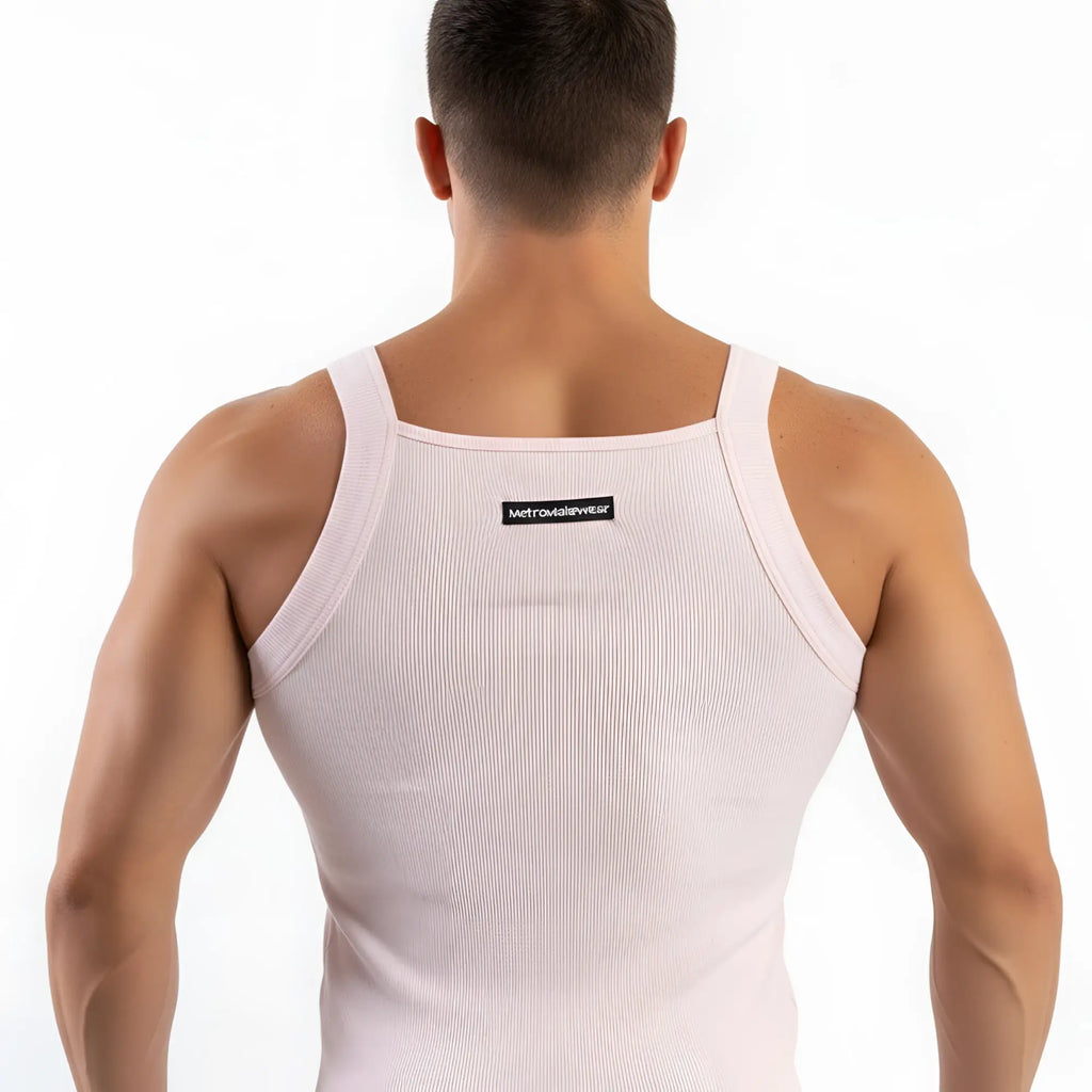 Back view of a white ribbed metro malewear primo pink tank top with thin straps and a small black label