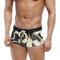Black MetroMaleWear Profundo swim boxer briefs with bold gold and white chain pattern and black waistband