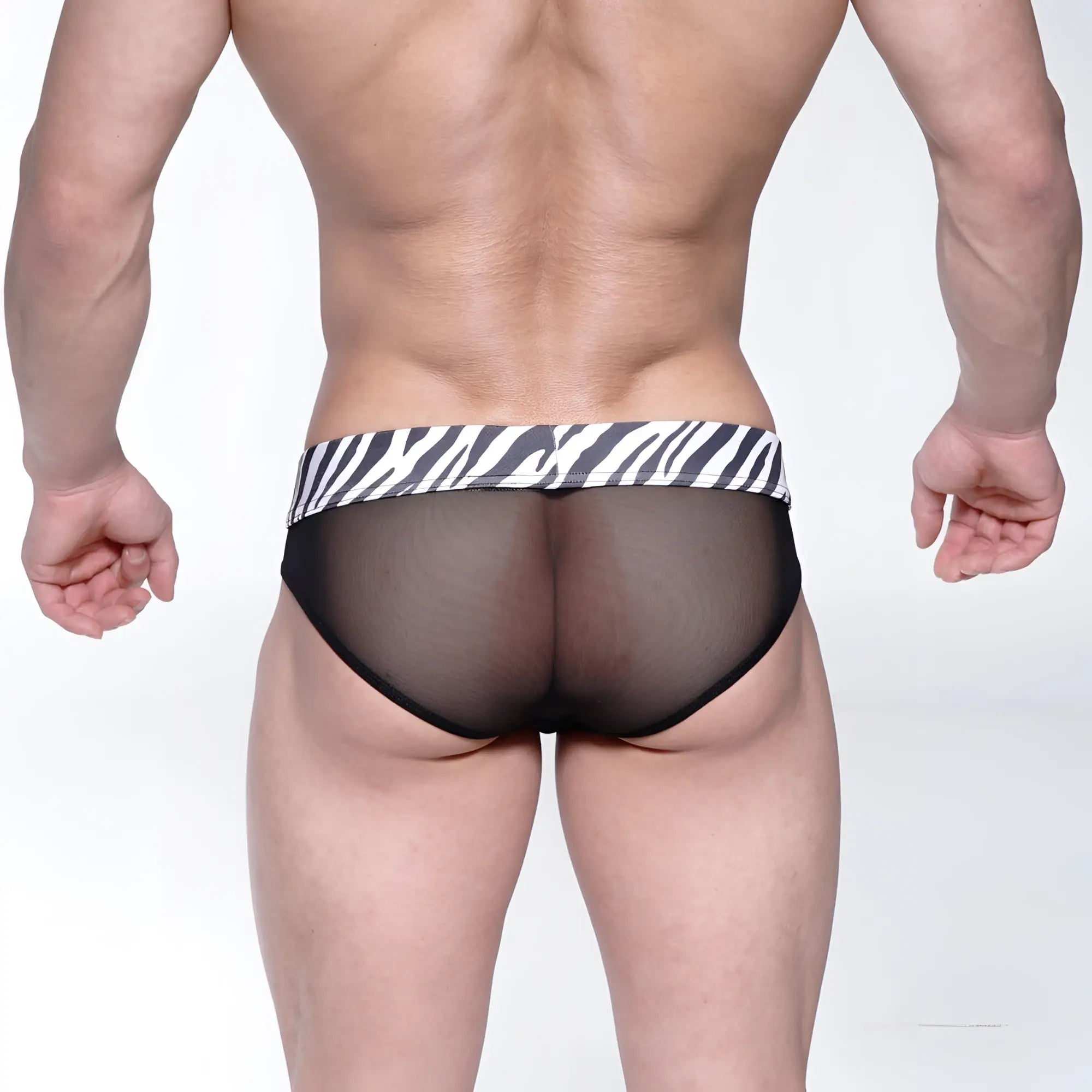 MetroMaleWear savage bikini black mesh briefs with bold black and white zebra-striped waistband front view