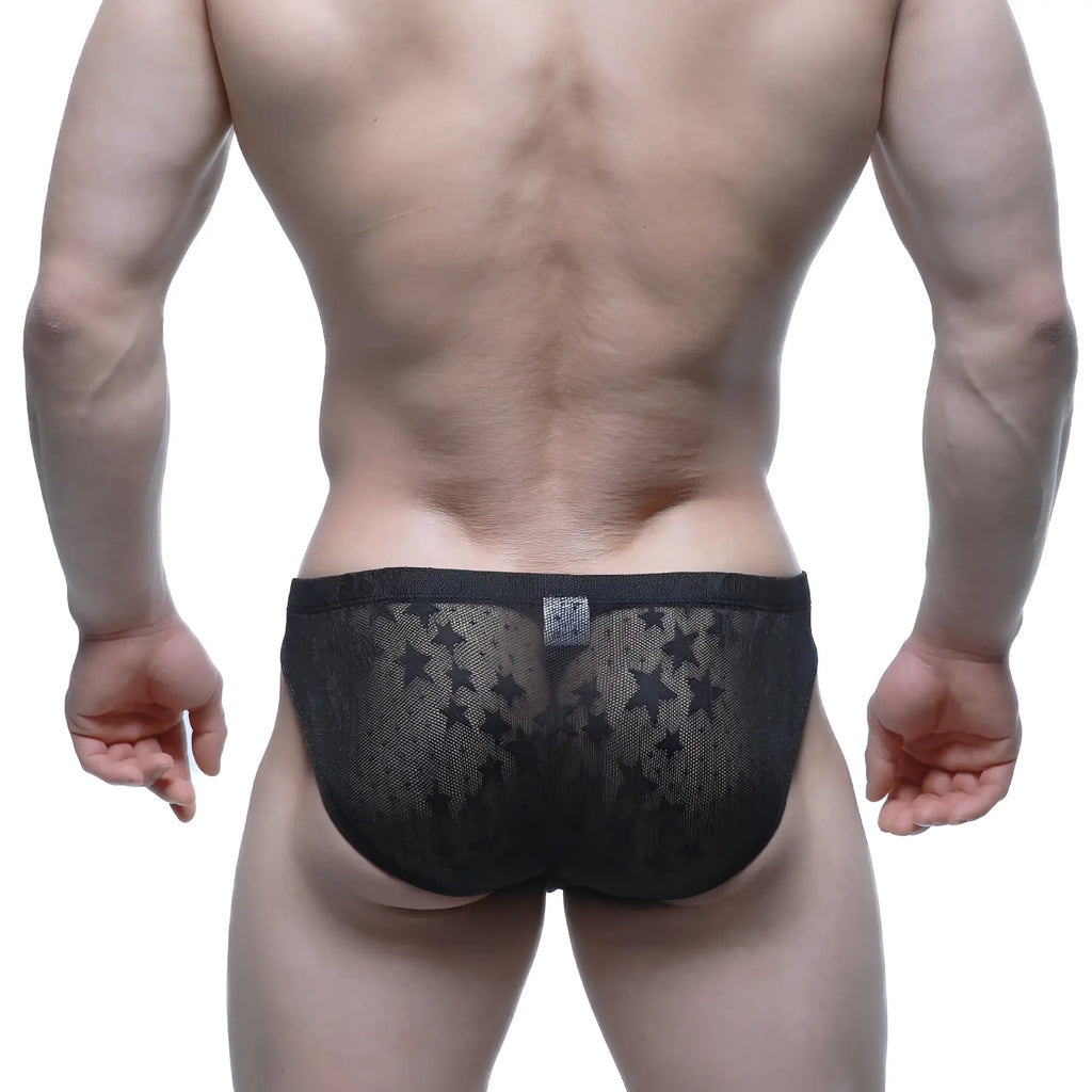 Black star patterned mesh briefs metro male wear stardust bikini in black showcasing front view