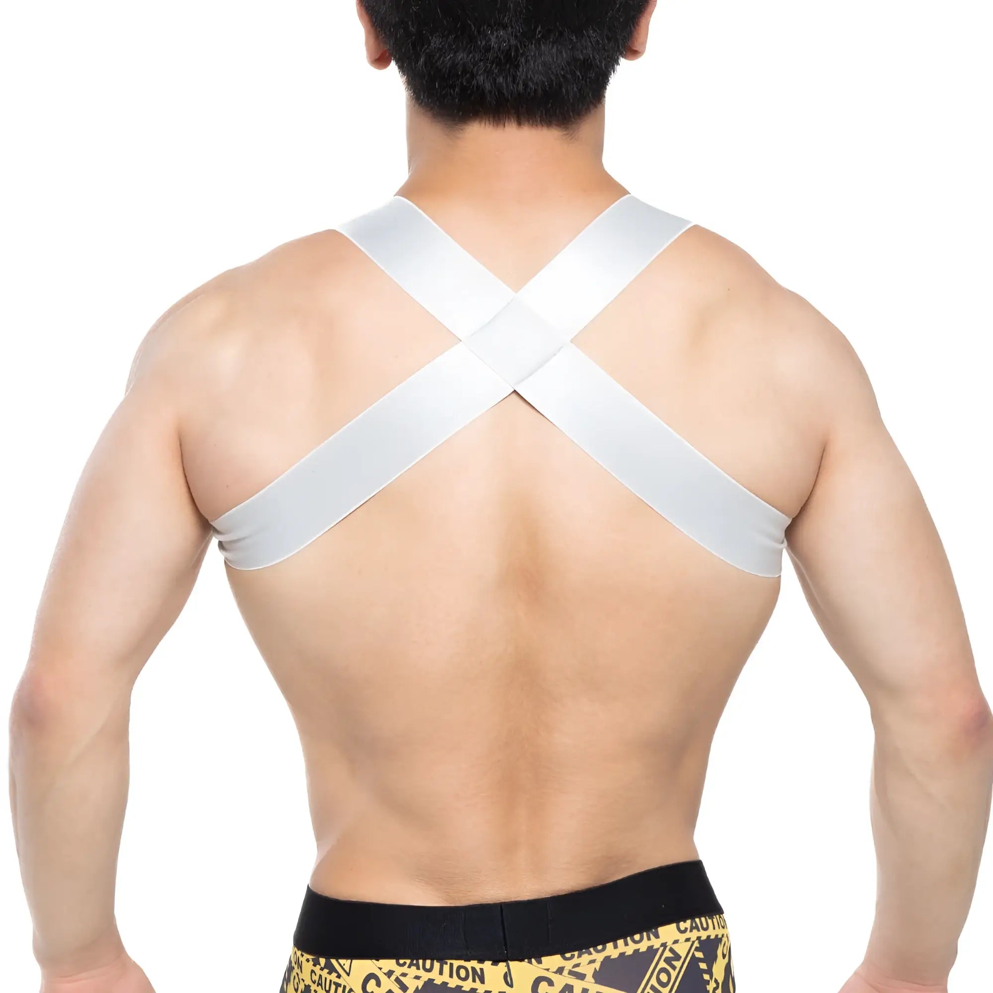 White cross-back support strap on the back of metromalewear steel harness 1400-10 for secure fit and durability