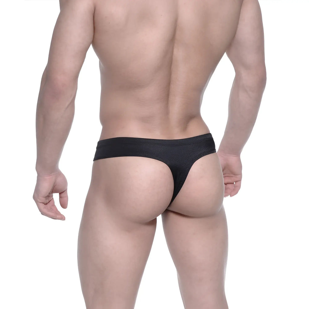 Black MetroMaleWear street swim thong made of stretchy fabric with a smooth seamless design shown from the back side