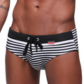 MetroMaleWear stripe swim brief black 4928-03 with black and white stripes, solid black waistband, and red brand tag