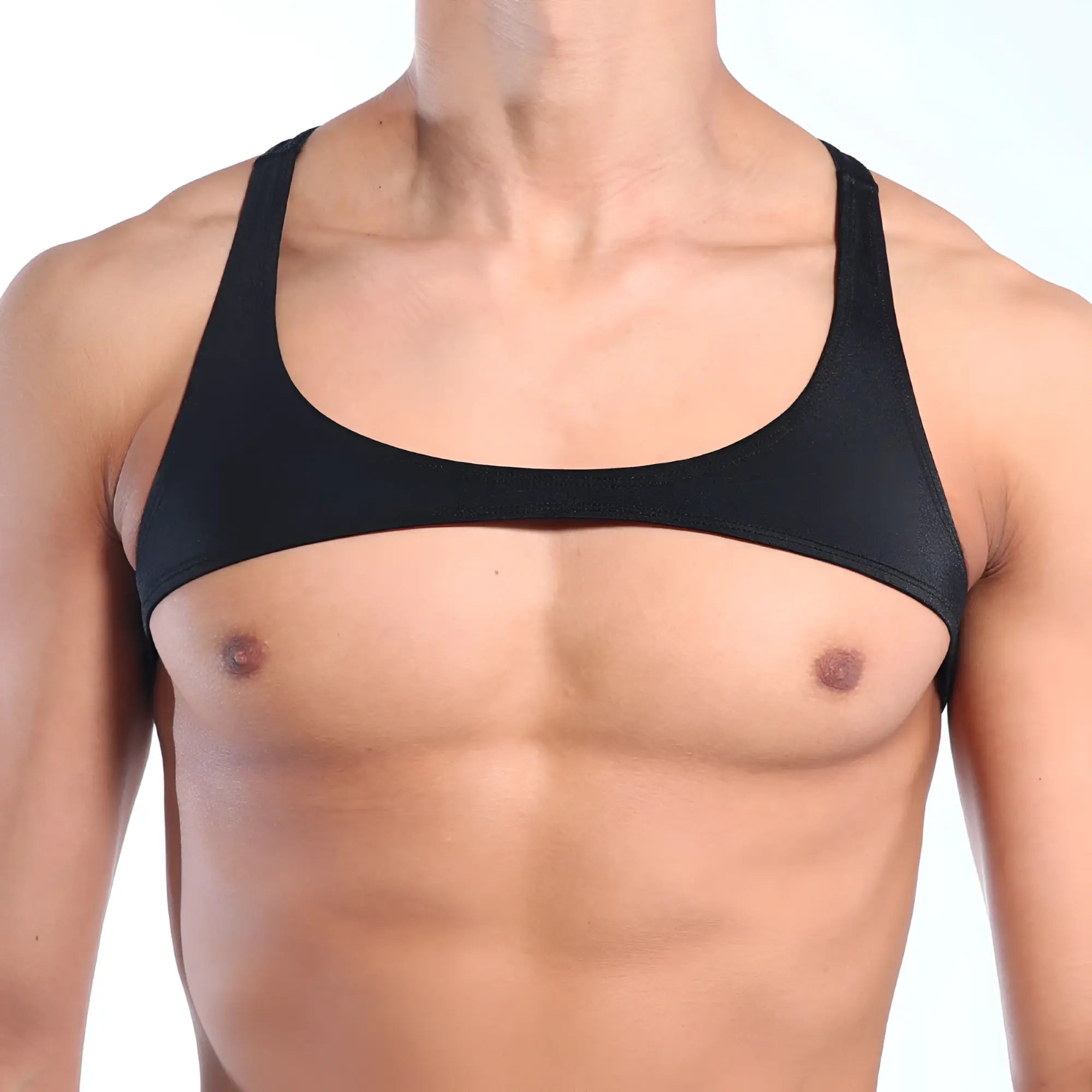 Black form-fitting MetroMaleWear tank top with wide shoulder straps and scoop neckline visible from the back side
