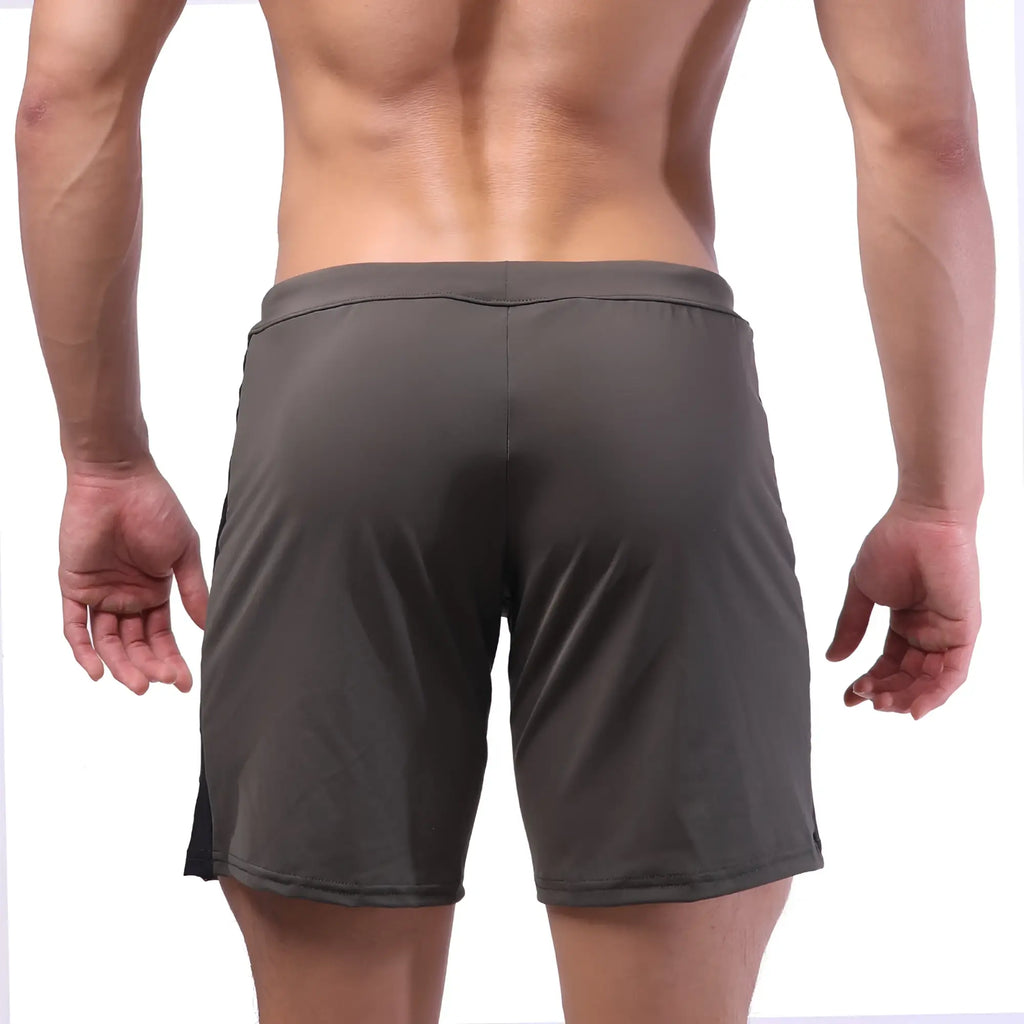 Dark gray metro malewear trainer shorts with sleek form-fitting design and subtle side seam detailing for athletic use