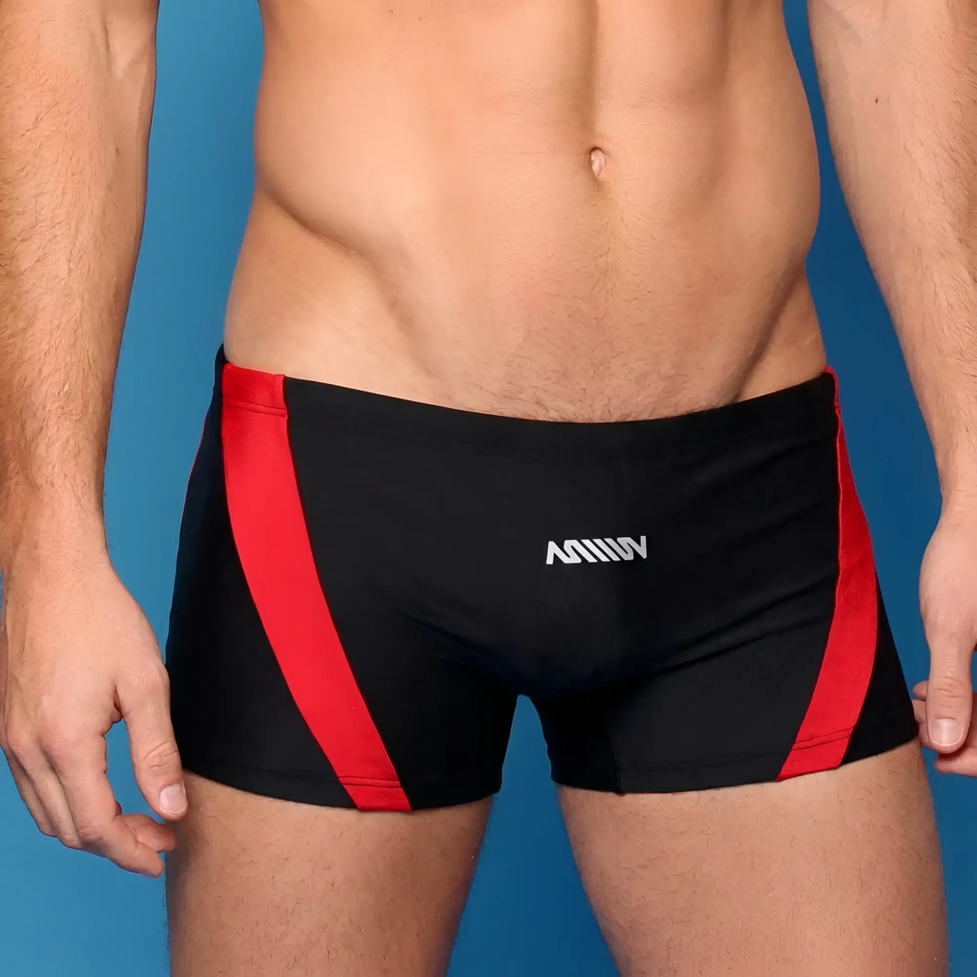 MetroMaleWear Ultra square cut black swim trunks with bold red side stripes and white aniiiv logo on front