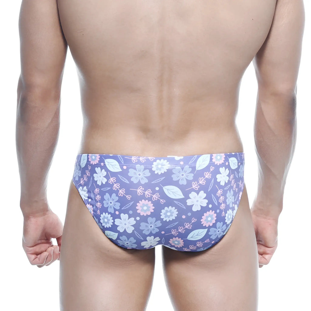 Purple floral swim trunks with light blue and pink blossoms on soft stretchy fabric metro male wear vasco hip brief