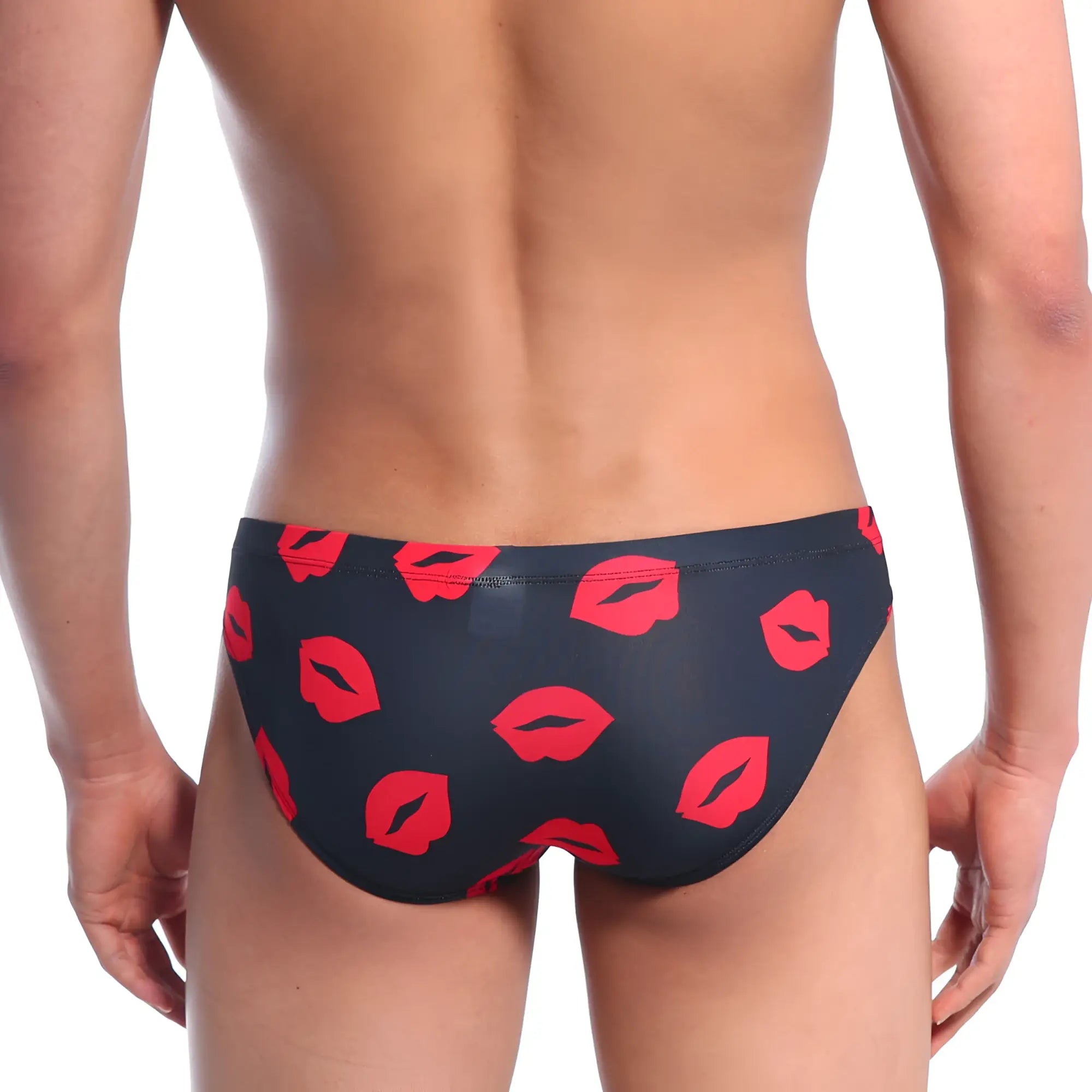 Black metro malewear vasco hip brief swim trunks with bold red lipstick print for stylish beachwear