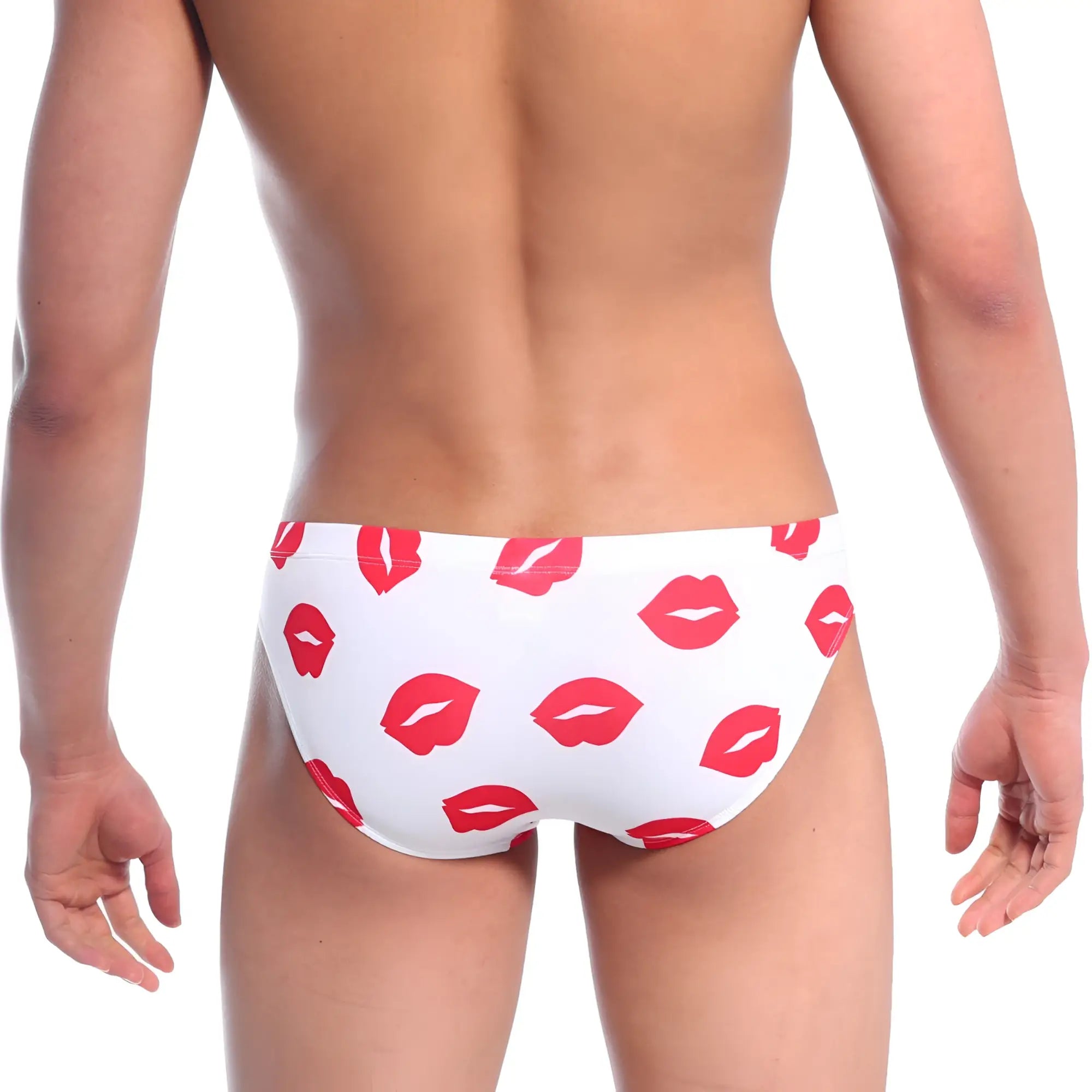 White swim trunks by metromalewear featuring a playful red lipstick kiss mark pattern for casual beachwear