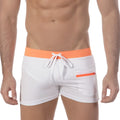 White swim trunks with bright orange waistband and zipper pocket featuring white drawstrings metro malewear zip swim boxer