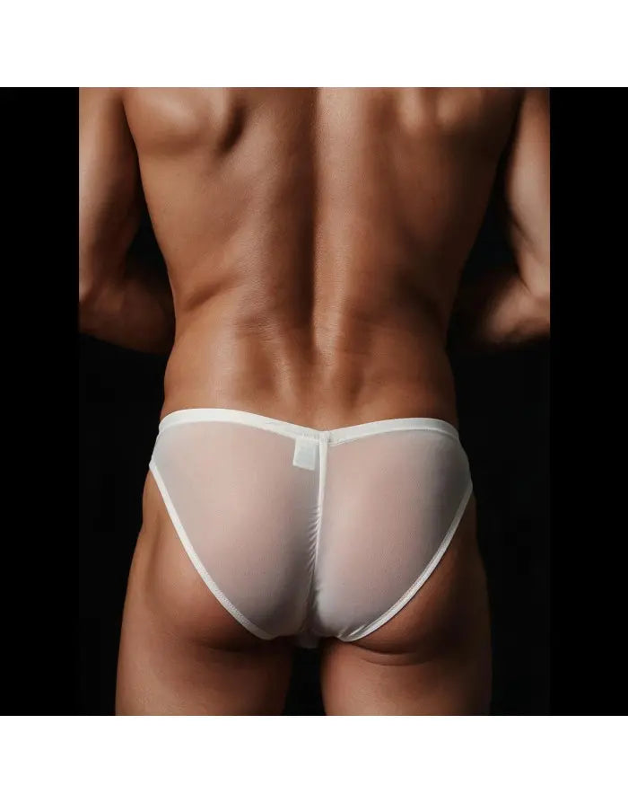 Cream micro bikini underwear by Arroyman featuring a sheer material and minimal coverage shown on a model from the back.