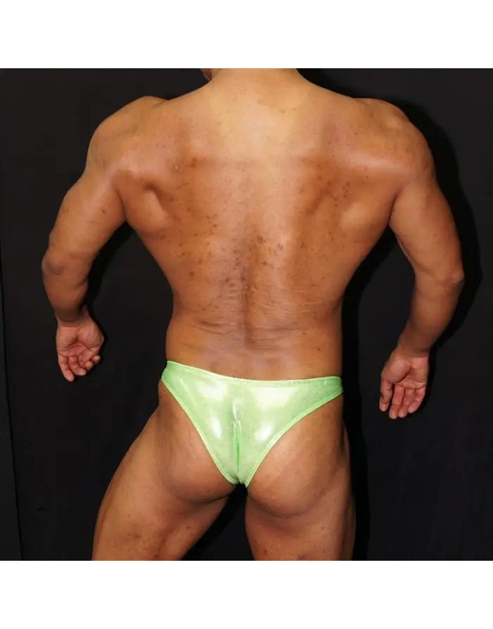 Fluor green micro bikini underwear by Arroyman featuring a shiny material and minimal coverage shown on a model from the back.