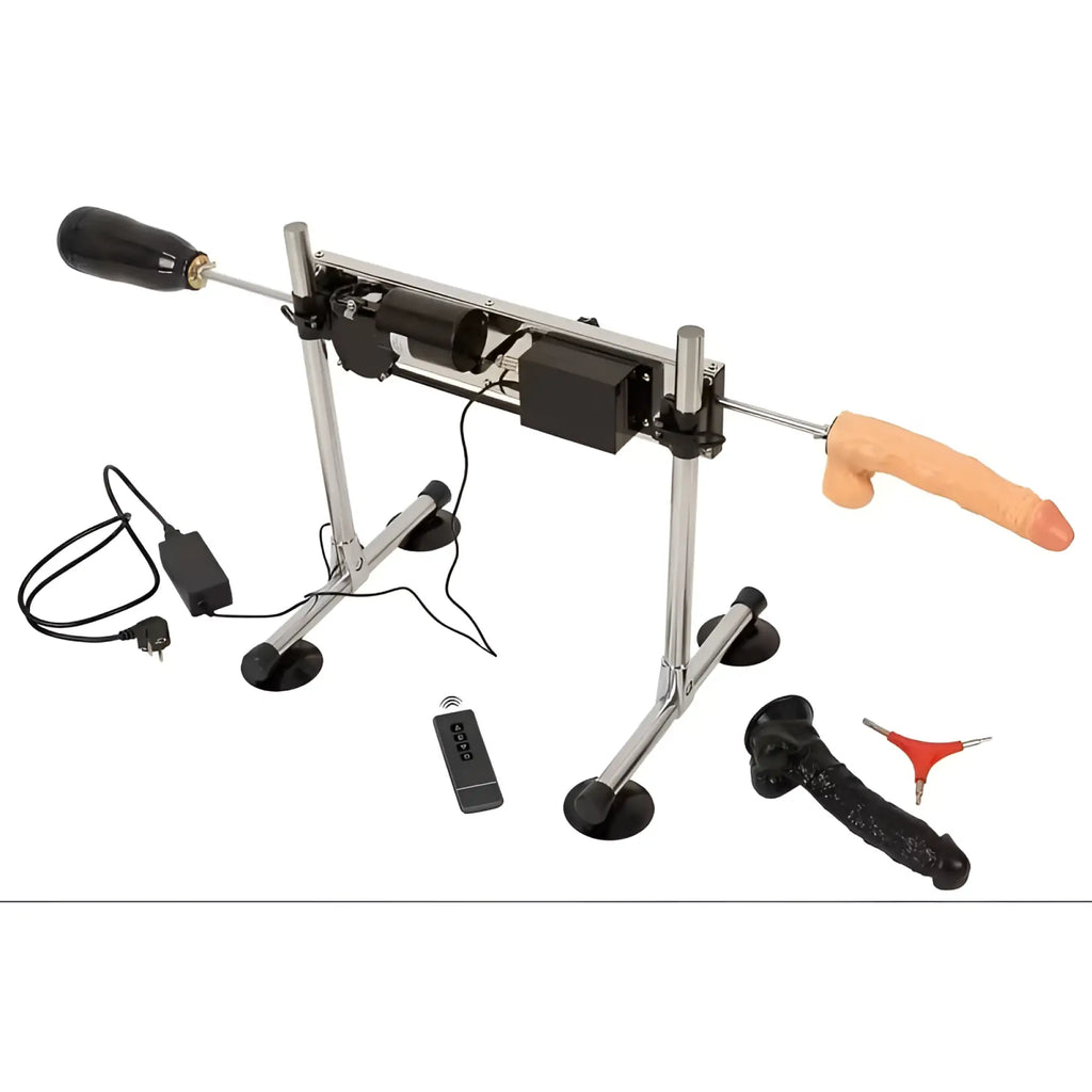Silver metal frame adult toy stand with black suction cups, motorized base, and two phallic silicone attachments