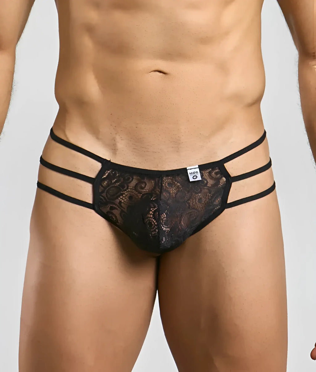Mob menâ€™s lace pouch thong in black lace with three horizontal elastic straps front view