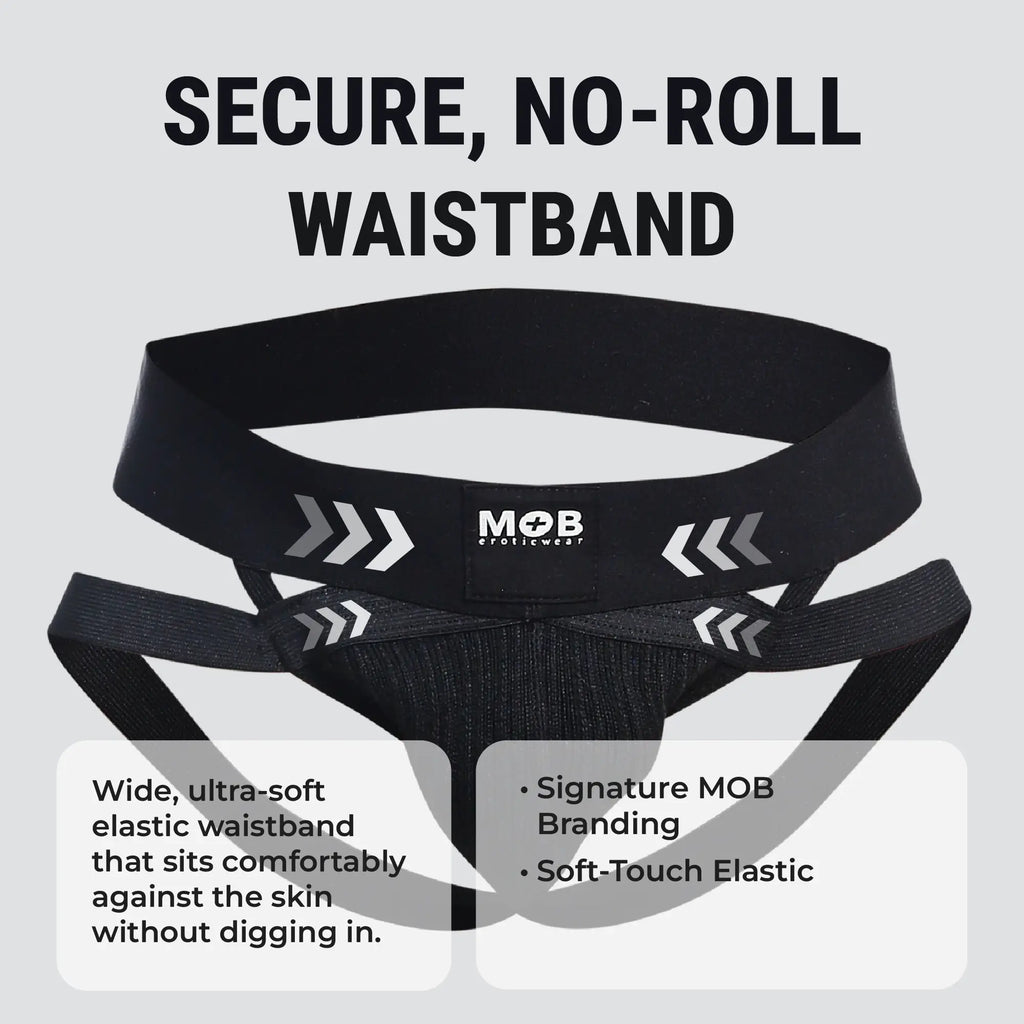 Menâ€™s x jockstrap with black elastic waistband featuring white arrow graphics and mob eroticwear branding back side view