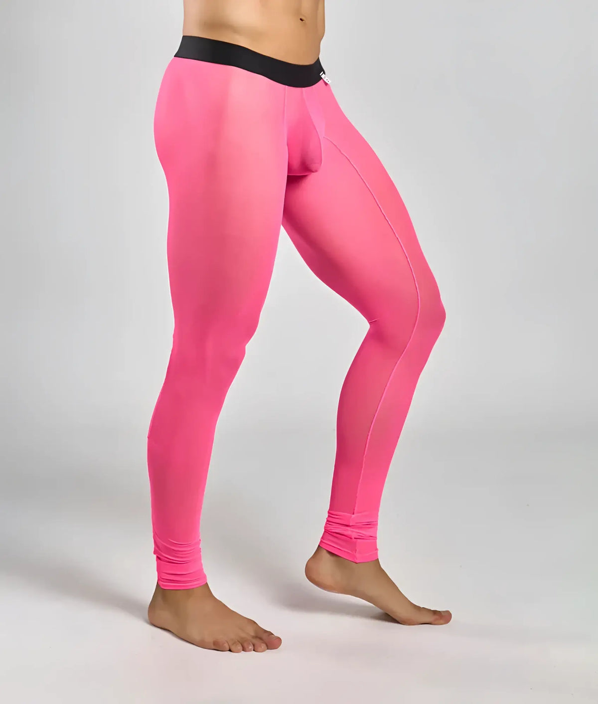 Bright pink sheer mesh leggings with black elastic waistband from mob mesh tights collection