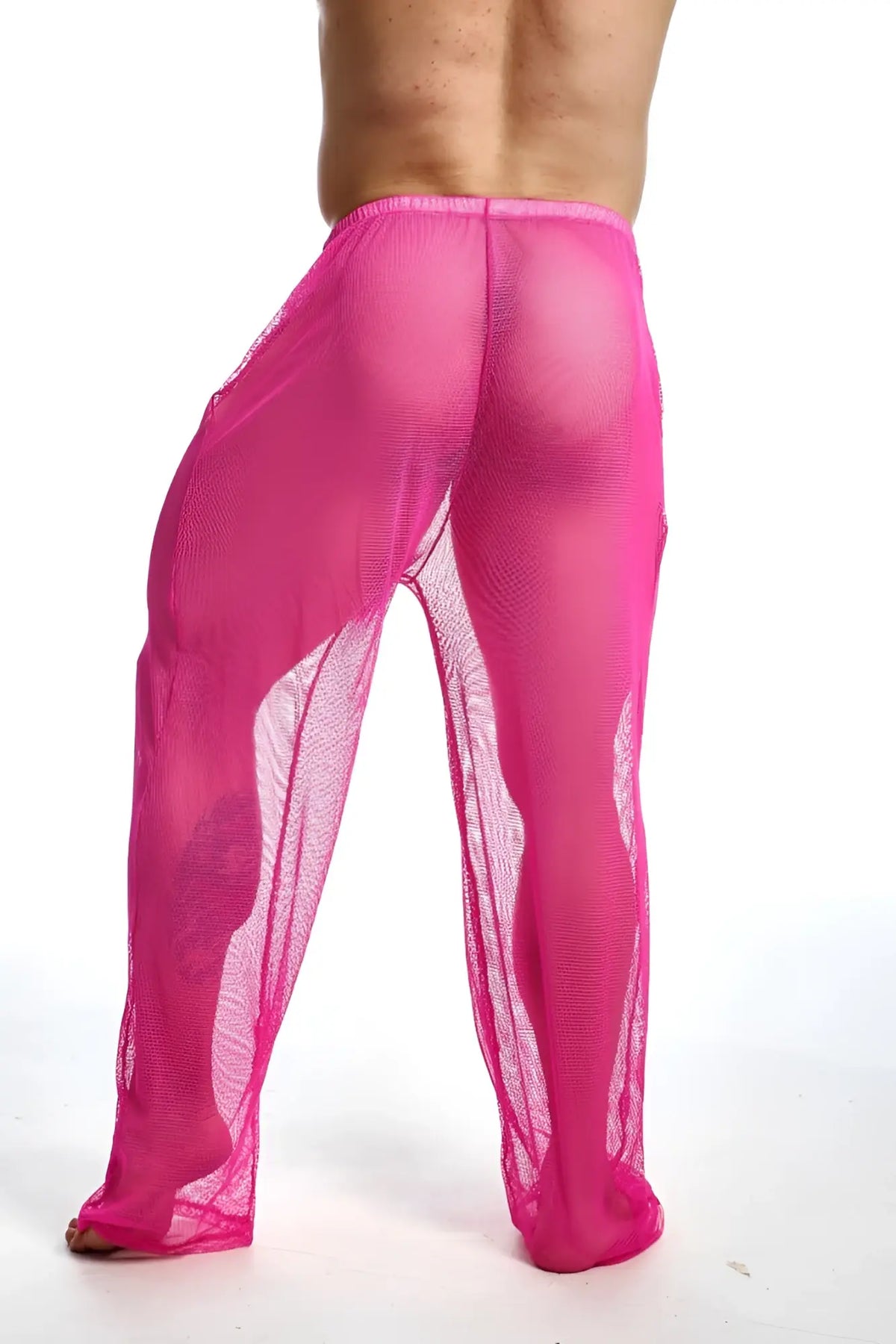 Bright pink sheer mesh mob fishnet pants with a flowing translucent design for stylish layering