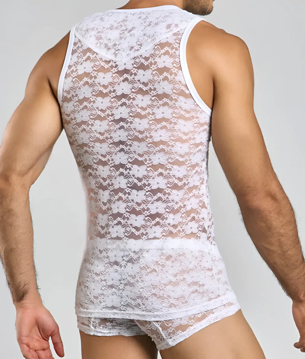 White floral lace tank top with sheer mesh panels and fitted design from mob ideal for stylish layering