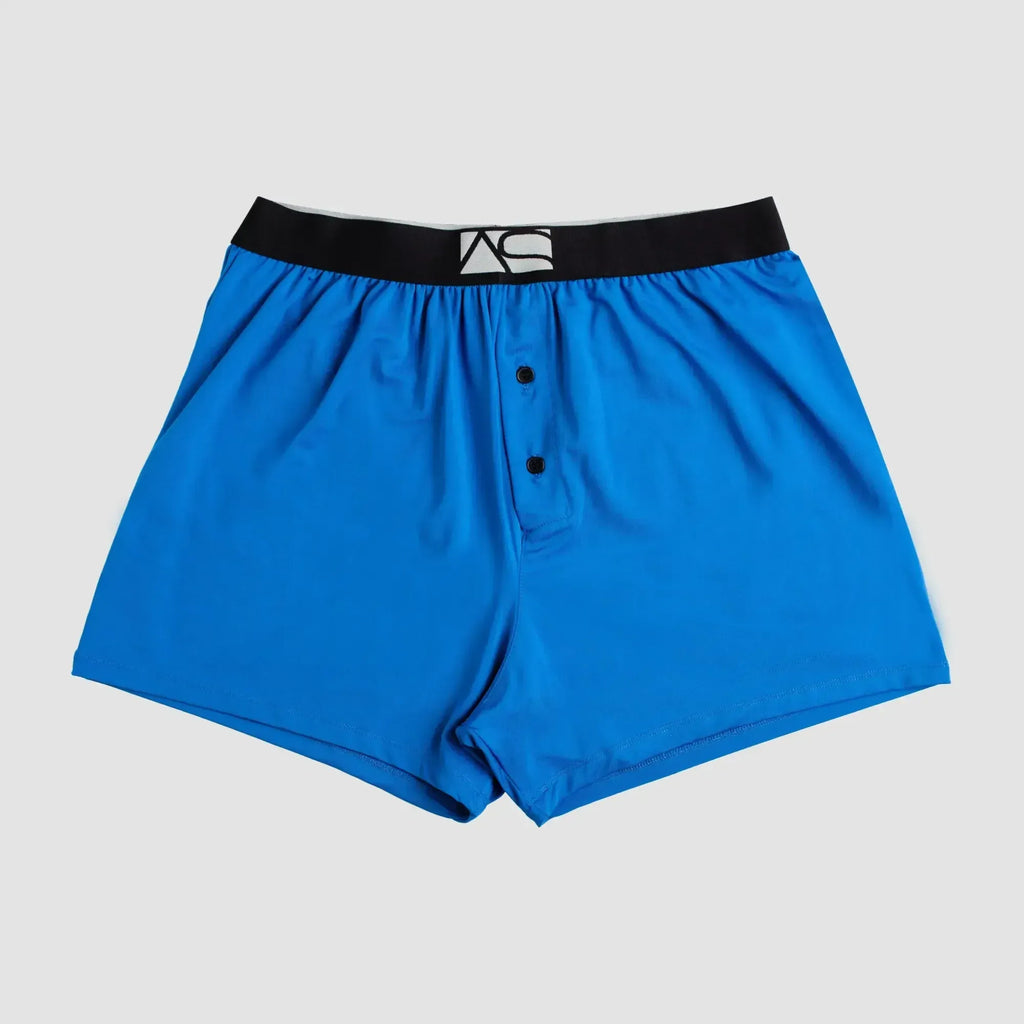 Modern boxer bright blue boxer shorts with black elastic waistband white logo and two front button closures