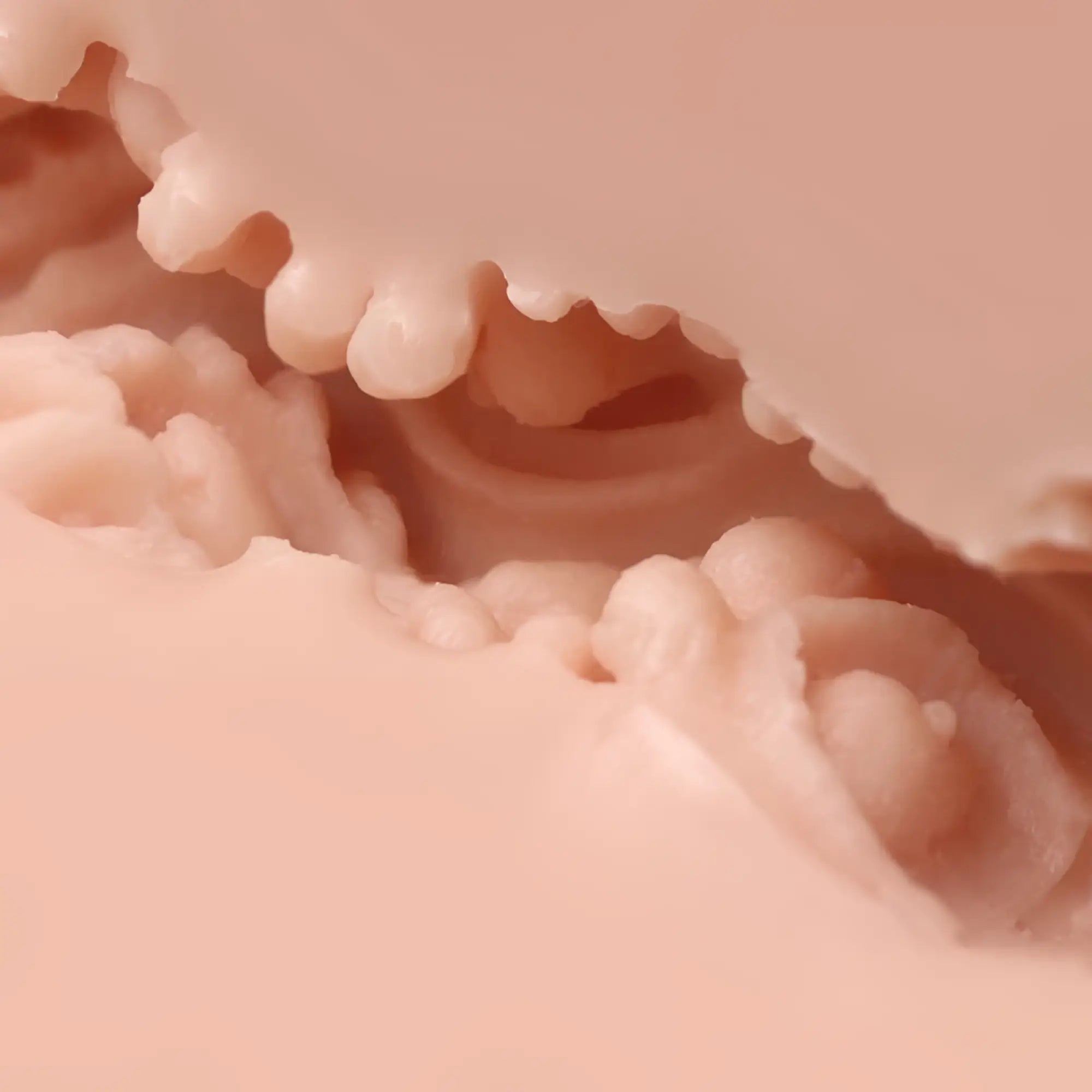 Pink silicone anal plug with textured ridged surface and rounded edges from naked factory anal masturbator anna
