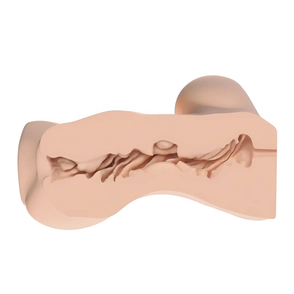 Beige silicone anal plug with textured ridged interior from naked factory jessica hand held torso masturbator