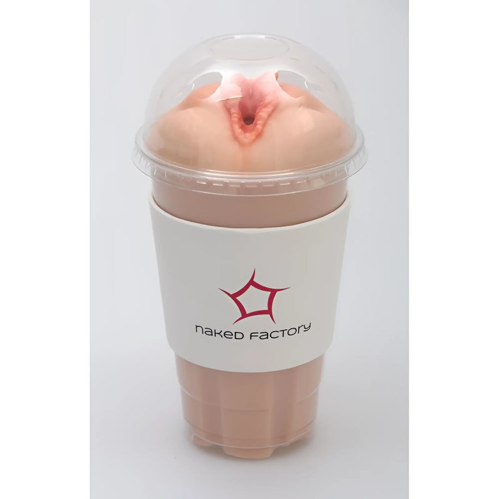 Pink silicone pussy masturbator by Naked Factory in clear plastic cup with white labeled sleeve Blair model