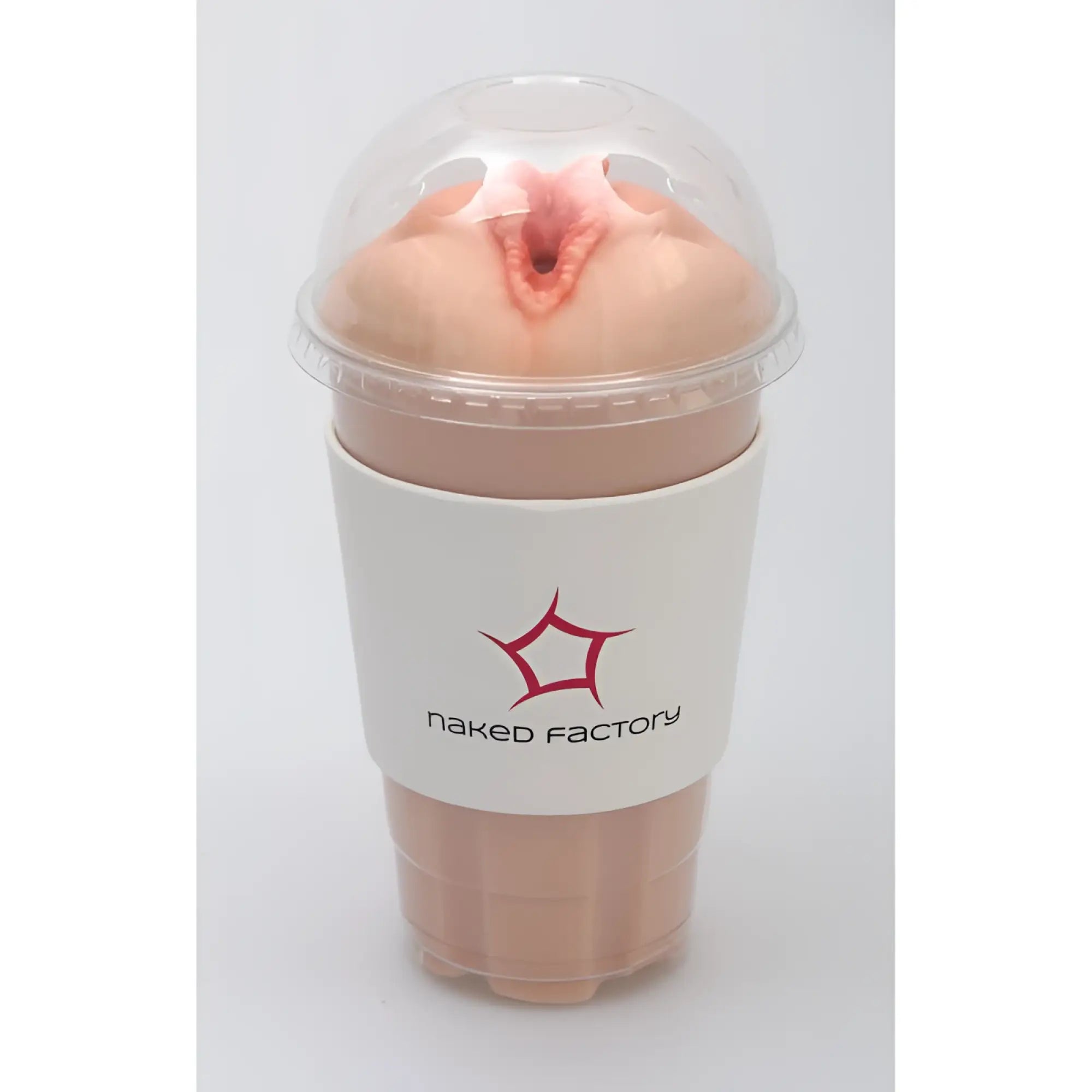Pink silicone pussy masturbator by Naked Factory in clear plastic cup with white labeled sleeve Blair model