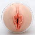 A realistic flesh-toned silicone anal plug with textured interior and central opening from naked factory pussy masturbator dani