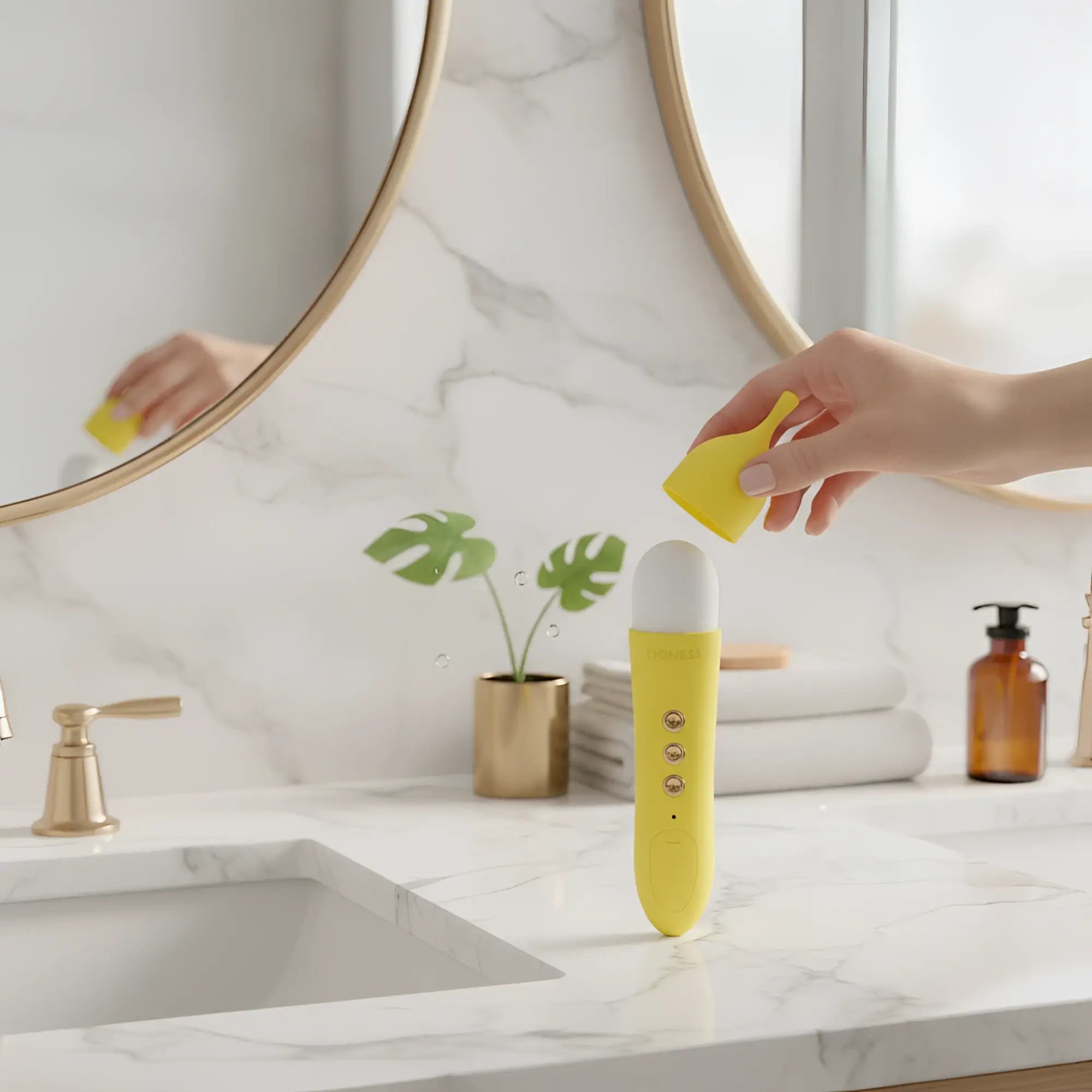 Yellow silicone banana cream air pulse g-spot vibrator with white rounded head and black circular opening