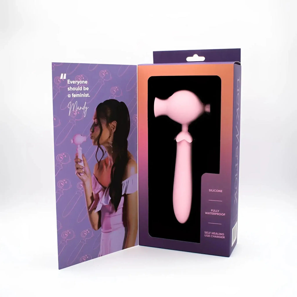 Pink silicone natalies toy box lick n stick clit flicker g spot vibrator in purple and orange packaging box