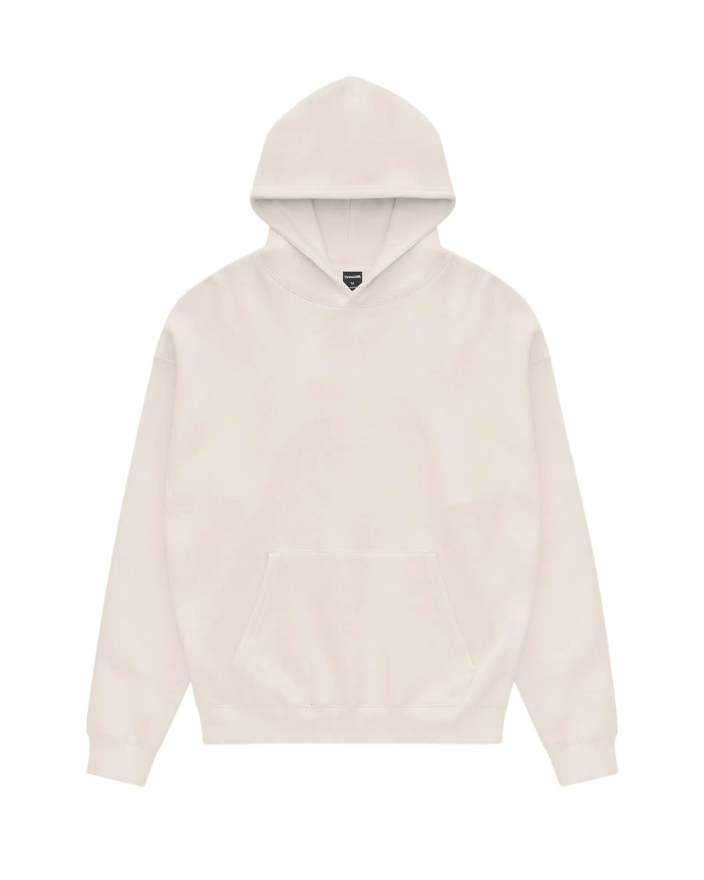 Cream-colored Core hoodie in a relaxed, pullover style with a large front kangaroo pocket and simple hood.
