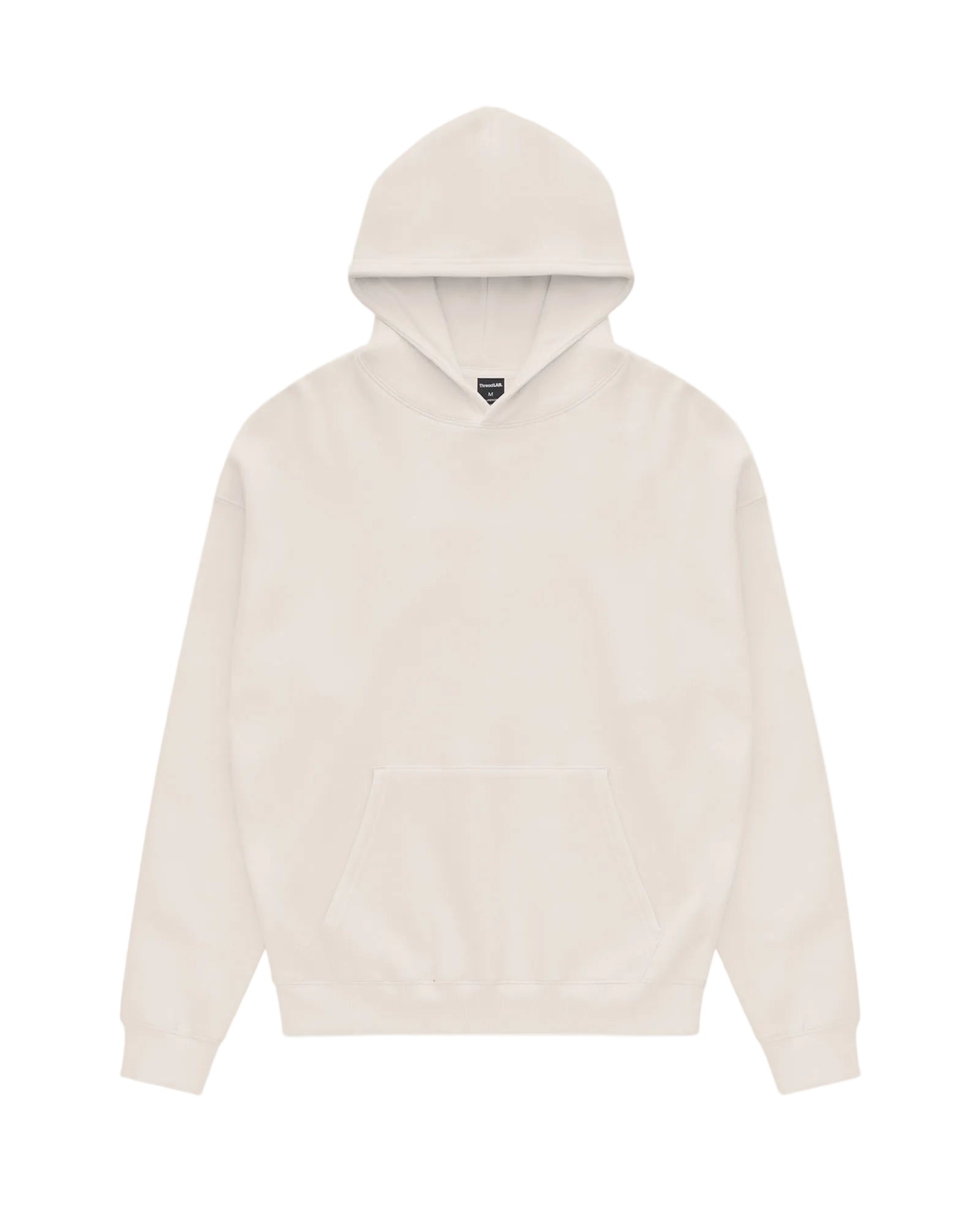 Cream-colored Core hoodie in a relaxed, pullover style with a large front kangaroo pocket and simple hood.