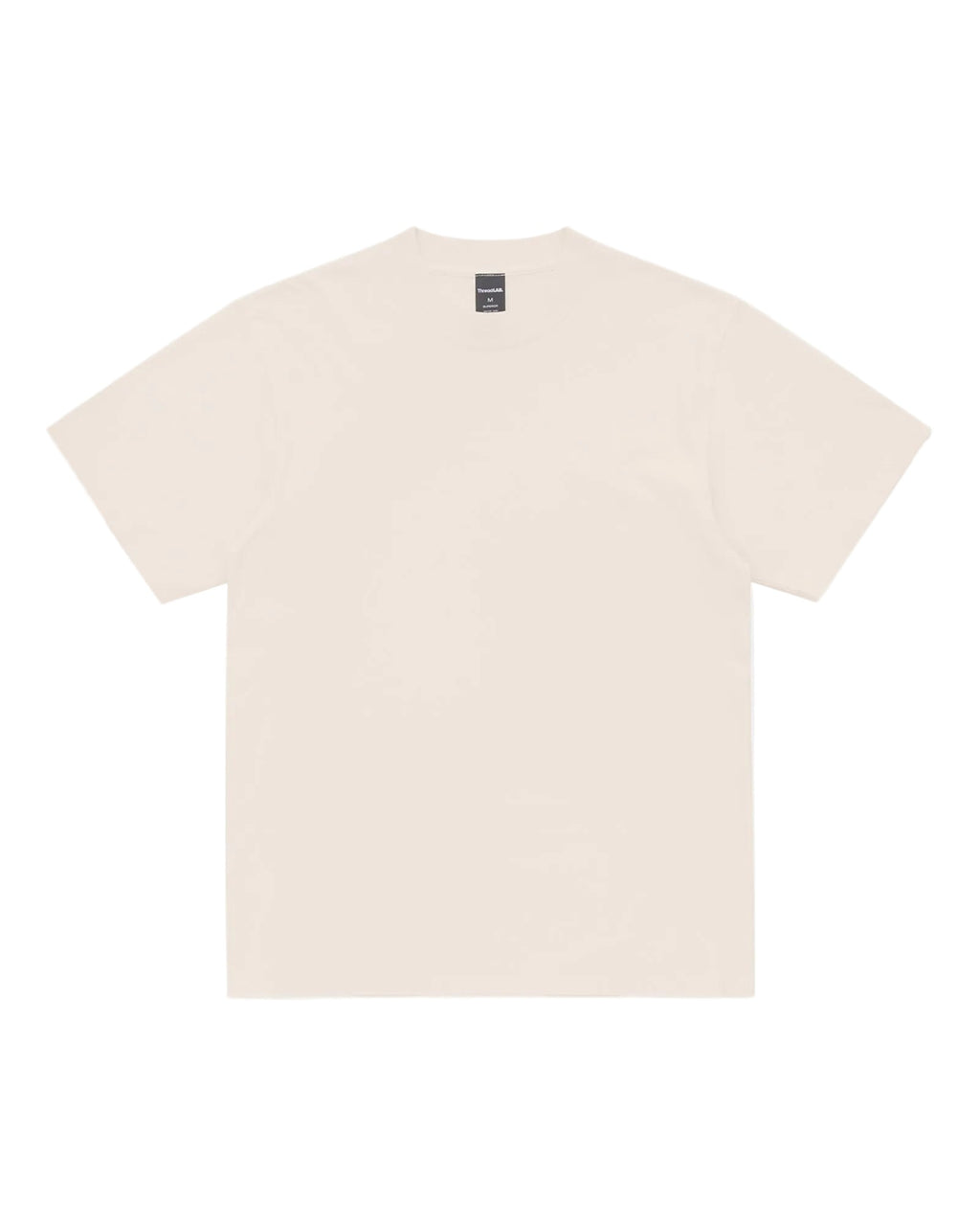 A plain cream-colored short-sleeve Superior Tee with a crew neck and a visible brand tag on the inner collar.