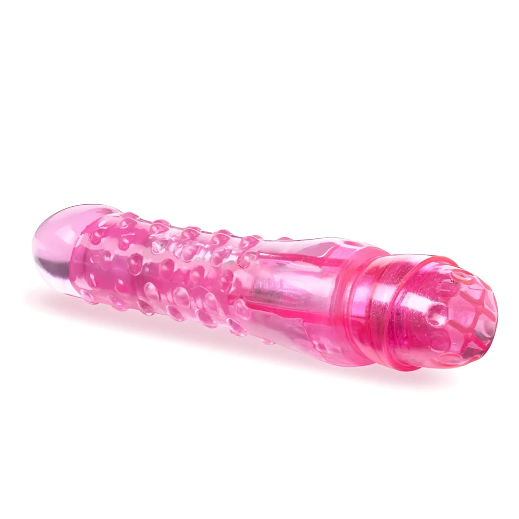 Naturally yours bump n grind pink translucent plastic vibratory toy with textured bumpy surface and rounded ends