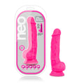 Bright pink neon silicone dildo with dual-density design and rounded base branded as neo for enhanced comfort