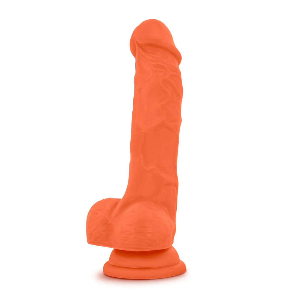 Neo Elite 7.5in silicone dual density dildo in neon orange with textured surface and rounded base
